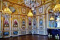 Louis-quinze-Boiserien mit farbigem Grisailledekor von Carle Van Loo und Jean-Baptiste Pierre in der Salle du Conseille,[6] Fontainebleau