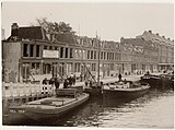 Afbraak van huizen langs de Baarsjesweg voor vervanging door nieuwbouw (op volgende foto); 1928.