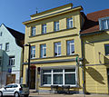 Wohn- und Geschäftshaus mit rückwärtigem Speicher (am Kirchenplatz) mit Winde