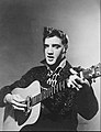 Image 22Elvis Presley in 1956, a leading figure of rock and roll and rockabilly. (from 20th century)