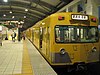 A train on the Tamagawa Line at Musashi-Sakai Station in 2008