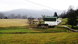 Farm in Alpine, with Alpine Mountain in the distance