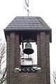 Glockenturm mit Glocke und Wetterhahn