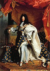 Louis XIV of France standing in plate armour and blue sash facing left holding baton