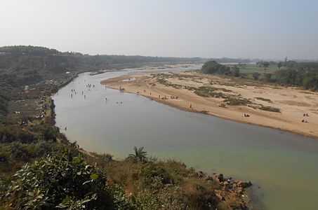 Tourists on the banks of Shilabati on New Year's Eve.