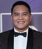 An image of John Arcilla.