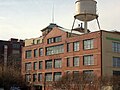 Close-up view of the back of the plant; Ponce City Market (formerly the Sears building, then City Hall East) in background