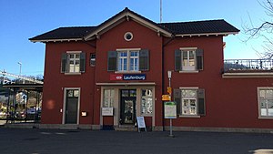 Two-story station building with gabled roof