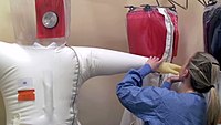 Regular inspection of positive-pressure suits to locate any leaks[33]