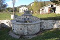 Brunnen an der Route du village