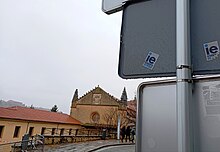 Two of the stickers next to the Segovia campus, in the background, calling for students to leave the city. These stickers, the result of social tension, are located throughout the city