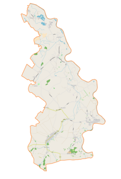 Mapa konturowa gminy Cisek, blisko centrum na dole znajduje się punkt z opisem „Dzielnica”