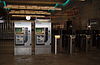 Fare gates and Charlie Card ticket machine at the MBTA World Trade Center Silver Line station in Boston