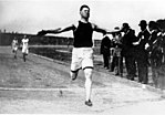 NFL player Jim Thorpe running the decathlon.