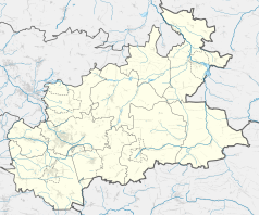 Mapa konturowa powiatu zawierciańskiego, blisko centrum na dole znajduje się punkt z opisem „Mokrus”