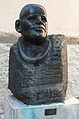 Bronze sculpture of Dietrich Bonhoeffer, at a side entrance of the Stadtkirche church, Germany