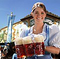 Image 5A waitress from the Hacker-Pschorr brewery carries beer mugs during the Oktoberfest  5 in Munich  4, Germany  3 (2011)