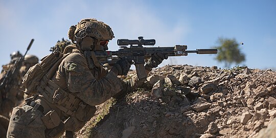 M27 with Squad Common Optic (SCO), KAC NT4 QDSS suppressor, and AN/PEQ-16