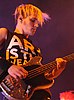 Bass guitarist of the band My Chemical Romance, Mikey Way, during a performance in 2011.