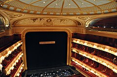 A photograph of the Royal Opera House auditorium