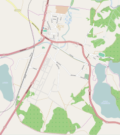 Mapa konturowa Orzysza, blisko centrum na lewo znajduje się punkt z opisem „Parafia wojskowa Świętego Kazimierza”