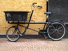 Somewhat heavier bike, steered by linkage. Amsterdam, Netherlands.