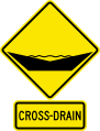 W6-3-4 Cross-drain. The supplementary plate with the inscription "CROSS-DRAIN" is optional.