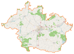 Mapa konturowa powiatu gnieźnieńskiego, w centrum znajduje się punkt z opisem „Kościół św. Wawrzyńca w Gnieźnie”