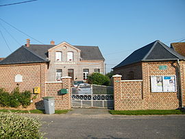 The town hall and school in Domesmont