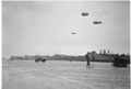 LST-60 and USS LST-30 along with two unidentified LSTs beached at Normandy, after 6 June 1944