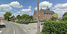 View of Ledringhem church, graveyard and town hall