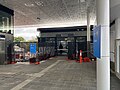 Station waiting area building from western end concourse, June 2023