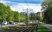 Widok ulicy na południe, od skrzyżowania z ulicami Bitwy nad Bzurą i Popielidów