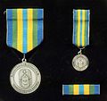 The Norrland Signals Battalion Commemorative Medal in silver; medal, miniature and ribbon bar