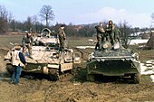 BTR-80 next to a U.S. Bradley Fighting Vehicle, 1996