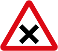 Intersection ahead in which priority must be given to vehicles on the right.