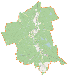 Mapa konturowa gminy Węgliniec, blisko centrum na dole znajduje się punkt z opisem „Parafiapw. Matki Boskiej Szkaplerznejw Starym Węglińcu”