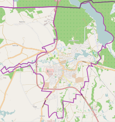 Mapa konturowa Gołdapi, u góry po prawej znajduje się owalna plamka nieco zaostrzona i wystająca na lewo w swoim dolnym rogu z opisem „Gołdap”