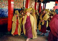 Monks hurrying to services, Tashi Lhunpo, 1993