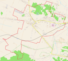 Mapa konturowa Piekoszów, blisko centrum u góry znajduje się punkt z opisem „Kościół Narodzenia Najświętszej Maryi Panny”