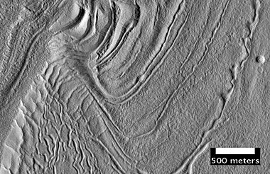 Surface of Nilosyrtis Mensae showing ridges and cracks, as seen by HiRISE, under the HiWish program