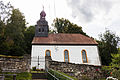 Kirche mit Ausstattung, Friedhof und Einfriedung