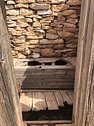 Inside the outhouse