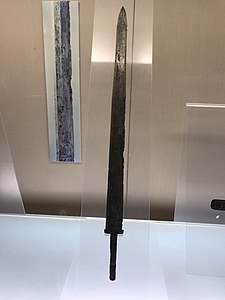 Sword from the tomb of king Helü. The inscription on the blade reads "Made for the personal use of lord Guang of Wu" (攻吾王光 自作用僉). Kept in Shanghai Museum.