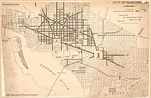 A map of Washington D.C., in 1884, with some roads in marked as paved in grey