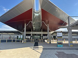 Entrance with large angular roof protruding out