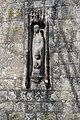 Carving on the south face of the tower of St Nicholas church in Durweston, Dorset, by Don Potter (1991)