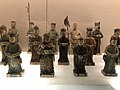 Tomb figurines of a soldier and two men holding an axe and ji polearm, Ming dynasty