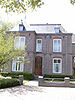 Pastorie met koetshuis annex catechisatiegebouw