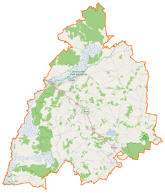 Mapa konturowa powiatu monieckiego, w centrum znajduje się punkt z opisem „Goniądz”